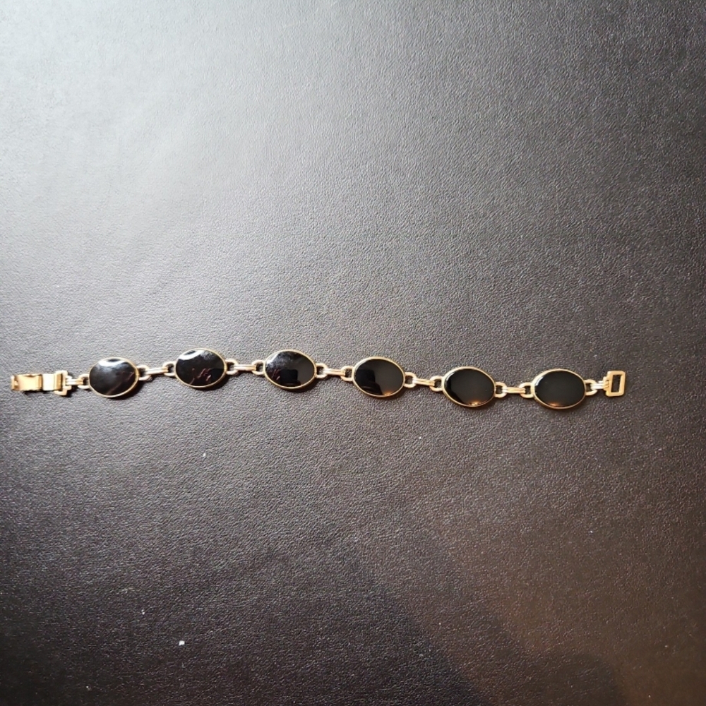Elegant Black and Gold Bracelet